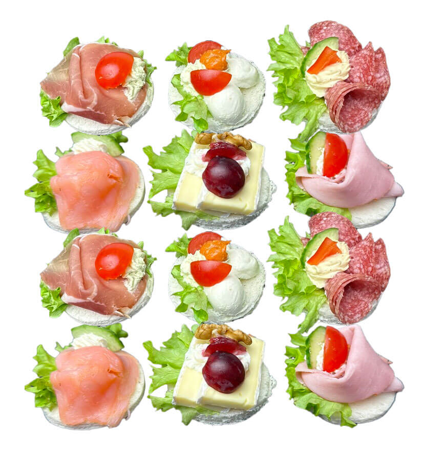 Canapés bunt gemischt – Canapés in Wien bestellen: edel angerichtet mit Lachs, Prosciutto, Beinschinken, Mozzarella, Brie und Salami. Jeder Biss ein voller Geschmack, perfekt für Empfänge, Business-Meetings, Partys oder private Feiern. Fingerfood in seiner elegantesten Form.