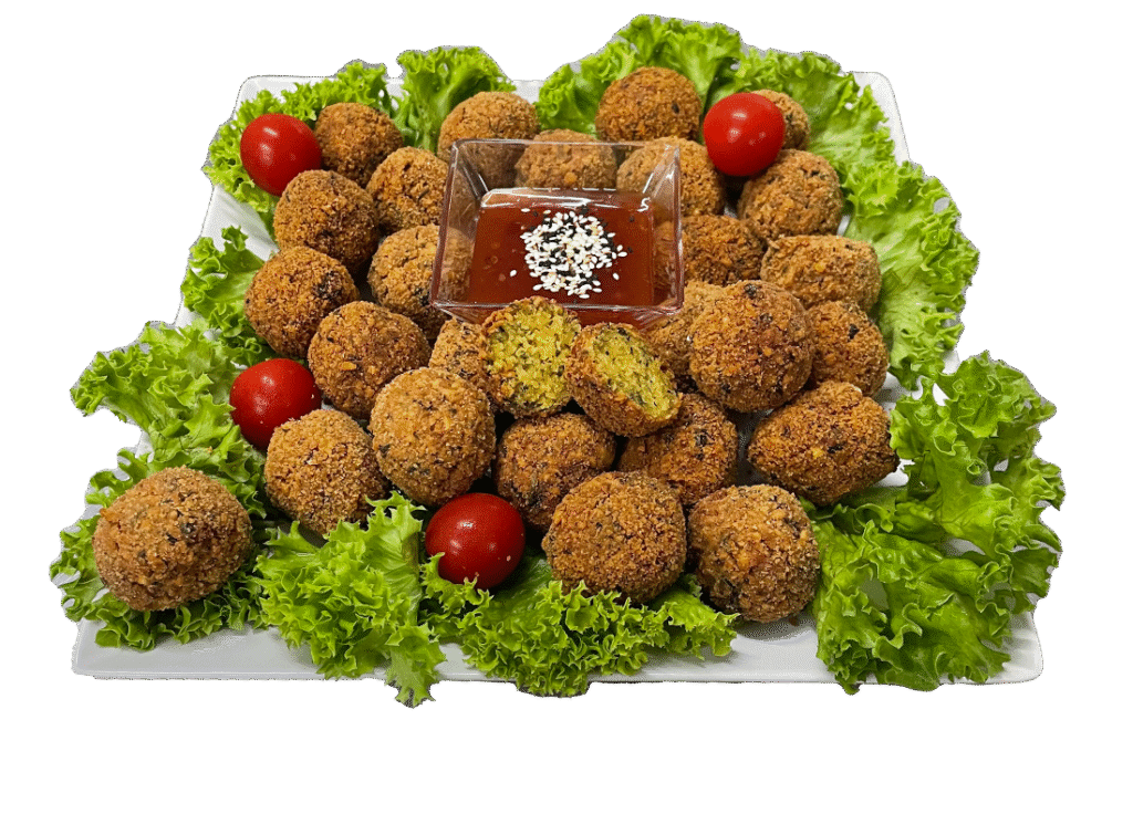 Vegane Falafel-Platte – orientalischer Genuss aus würzigen Kichererbsen-Bällchen, frisch zubereitet und perfekt für Ihr Buffet oder Catering in Wien.