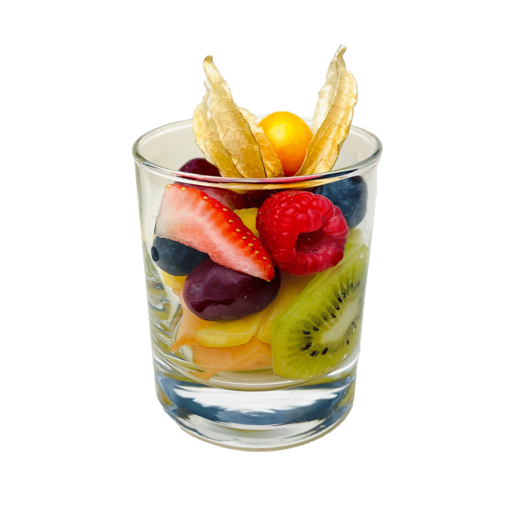 Fruchtsalat im Glas – Fruchtsalat in Wien bestellen: bunte Mischung aus saisonalem Obst, frisch geschnitten und dekorativ im Glas serviert. Ab 5 Stück erhältlich, perfekt für Meetings, Catering oder Büro-Pausen.