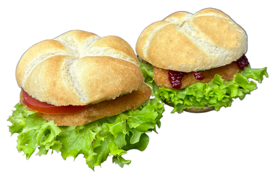 Schnitzelsemmel in Wien bestellen – saftiges Hühnerschnitzel mit Tomate, Salat und Cocktailsauce oder Wild-Preiselbeeren in Jour-Semmel.