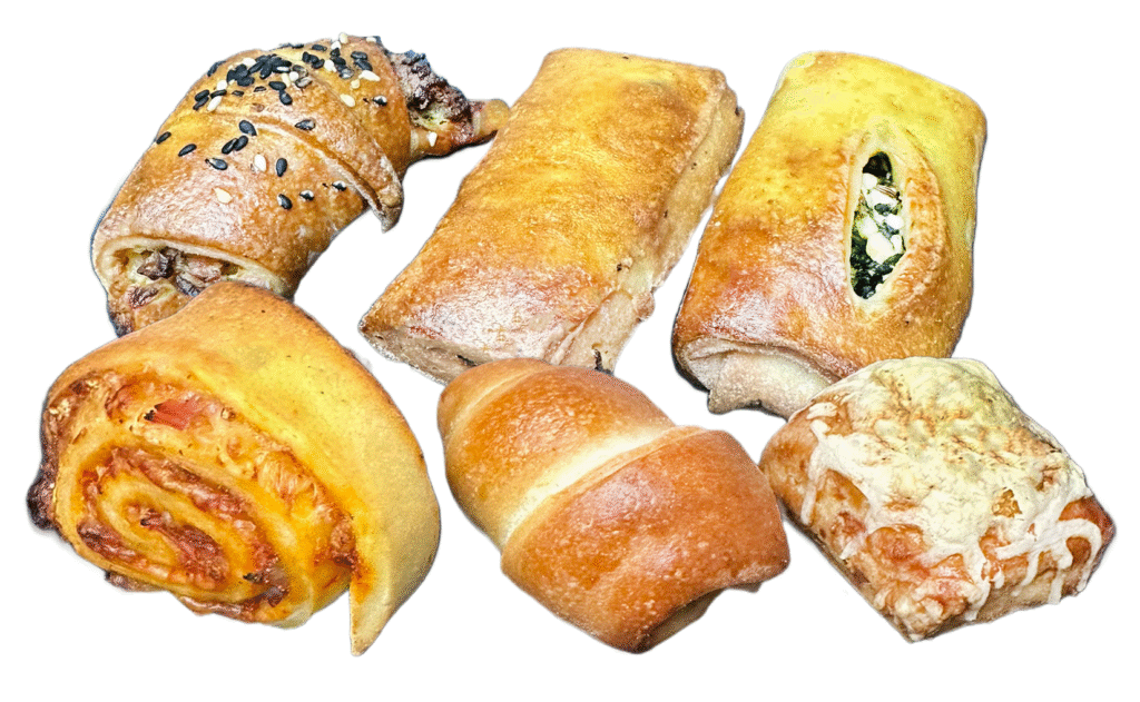 Pikante Happen bestellen Wien – frisch gebackene Germteig-Snacks wie Schinkenkipferl, Würstel im Schlafrock, Spinattascherl, Speckweckerl & Käsesnack.